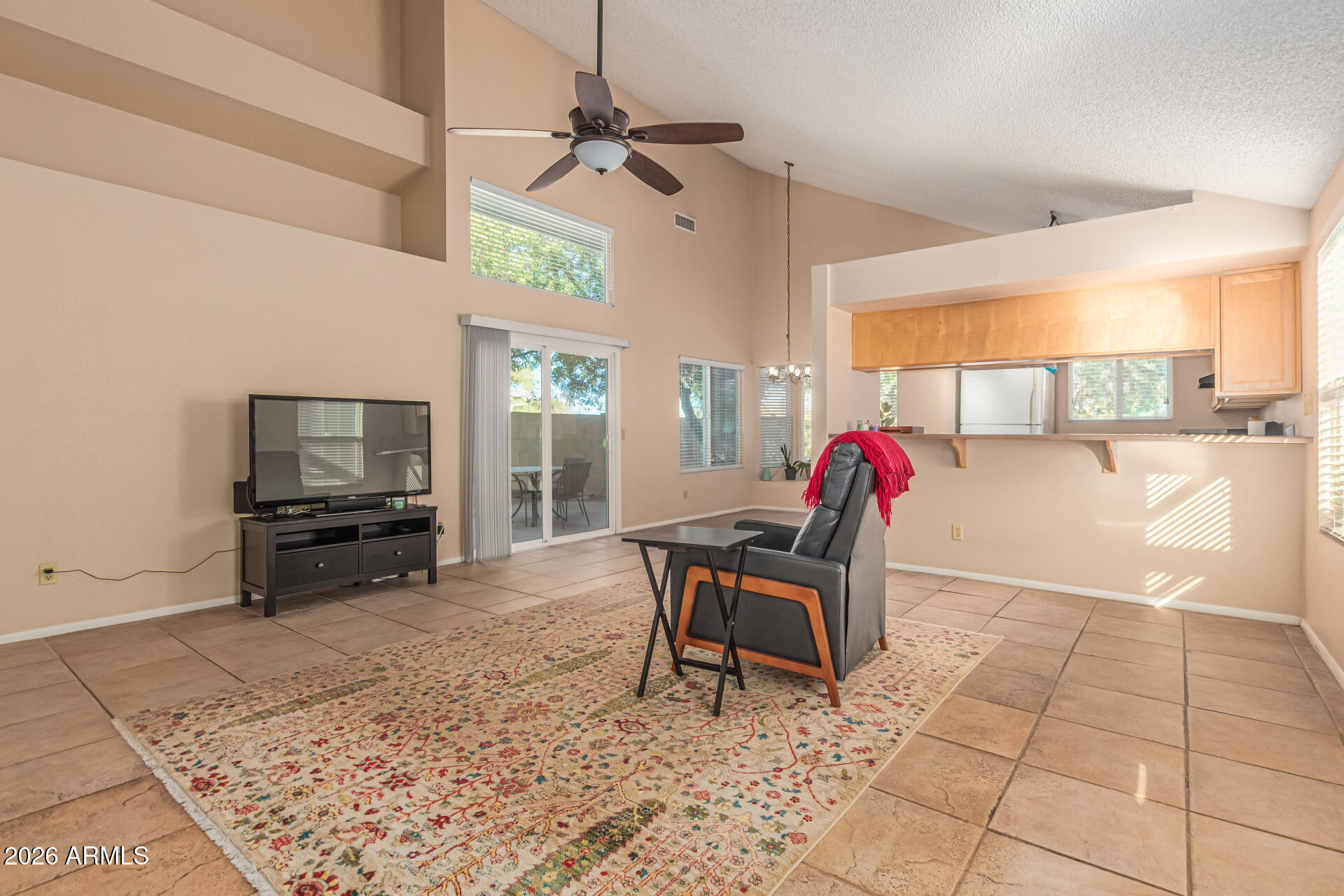 3904 West Butler Street Chandler, AZ 85226 - Photo 9 of 30 a living room with a couch and a coffee table