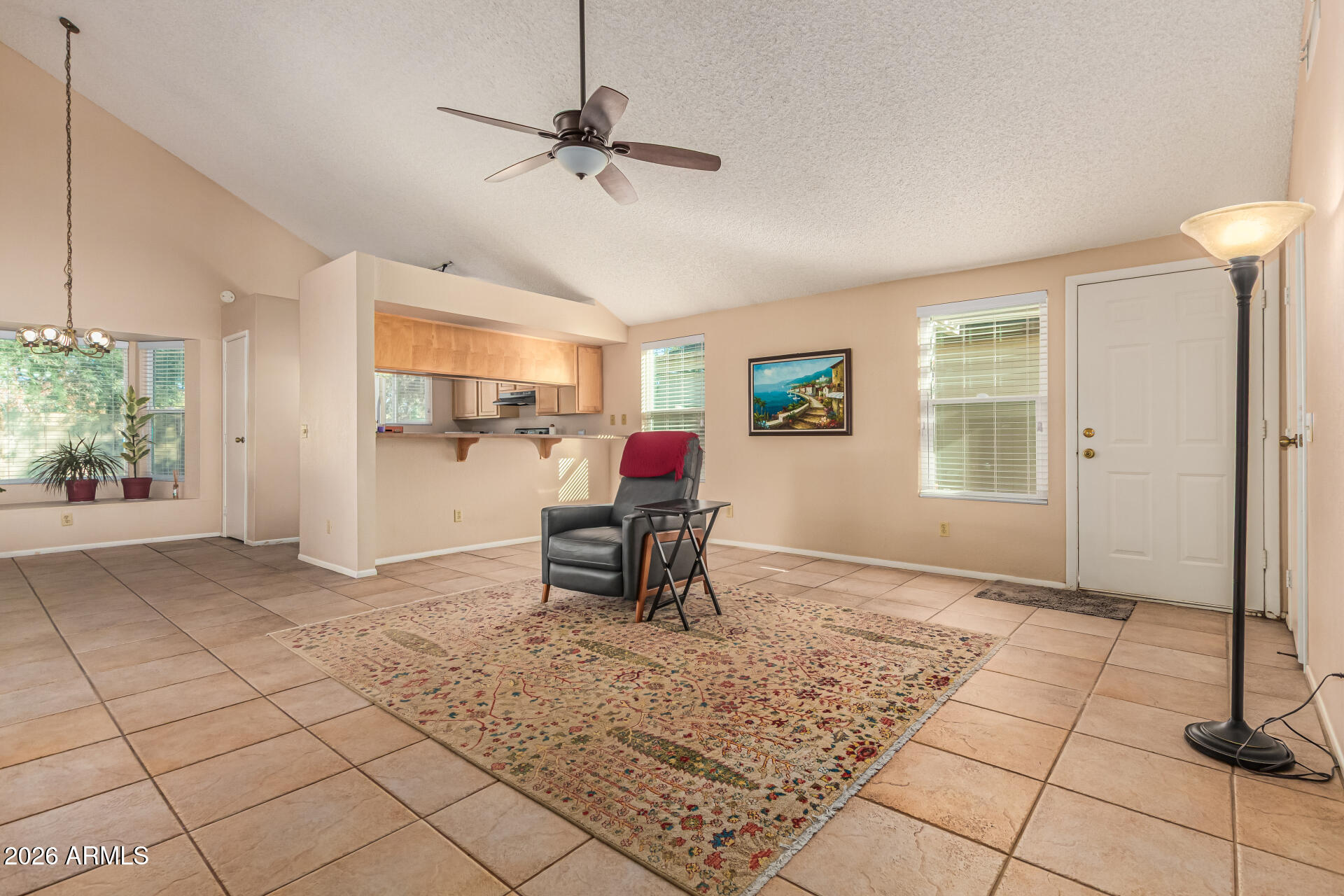 3904 West Butler Street Chandler, AZ 85226 - Photo 10 of 30 a view of a livingroom with furniture and a window