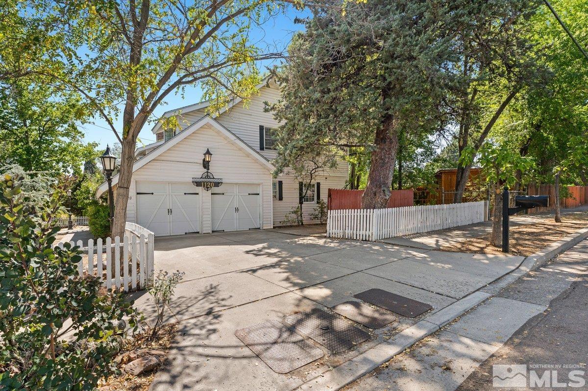 1120 Monroe Street Reno, NV 89509 - Photo 1 of 27 a house with a tree in front of it