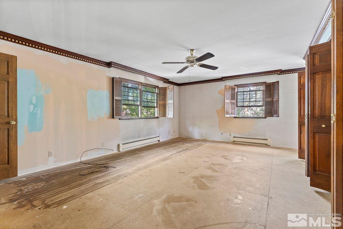 1120 Monroe Street Reno, NV 89509 - Photo 14 of 27 a view of an empty room with a window