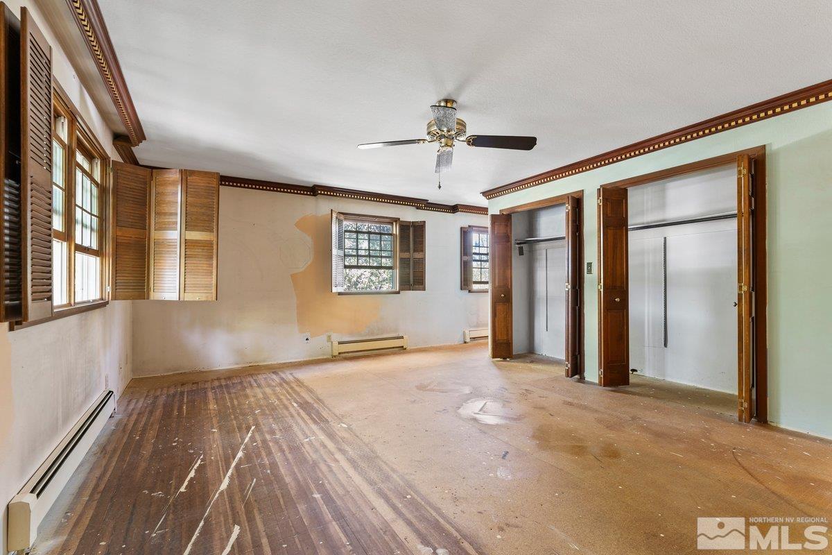1120 Monroe Street Reno, NV 89509 - Photo 15 of 27 a view of an empty room with a window and a chandelier