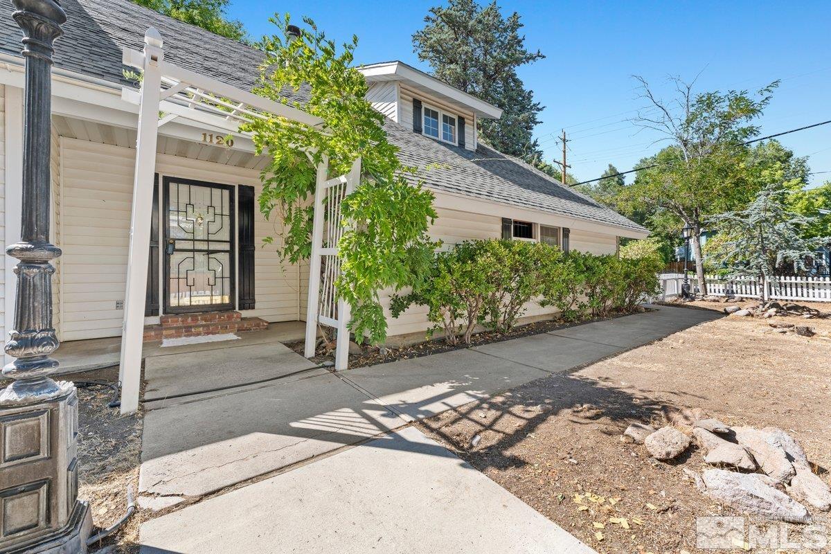 1120 Monroe Street Reno, NV 89509 - Photo 2 of 27 a view of a garden with a pathway