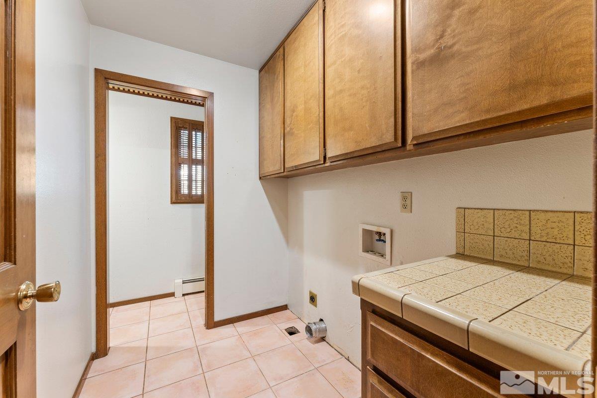 1120 Monroe Street Reno, NV 89509 - Photo 21 of 27 a kitchen with a stove and a microwave