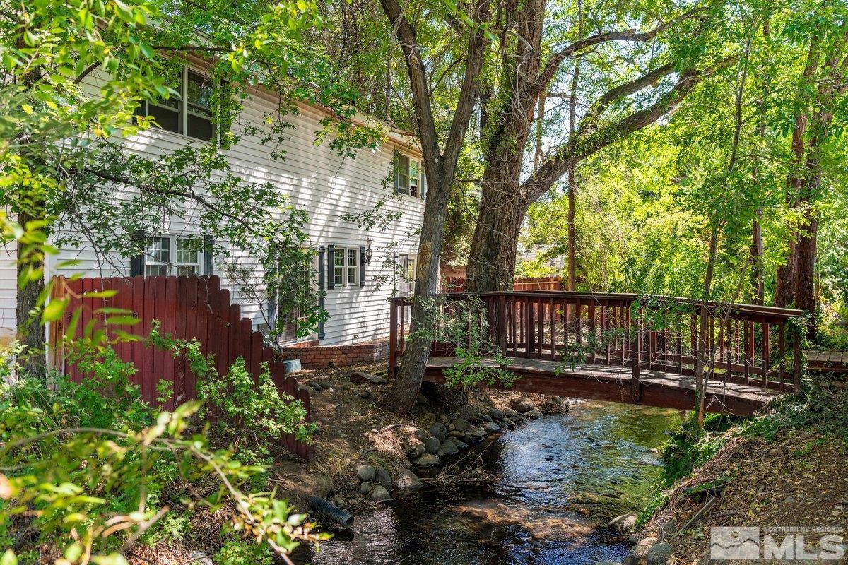 1120 Monroe Street Reno, NV 89509 - Photo 24 of 27 a view of a wooden deck with a large tree