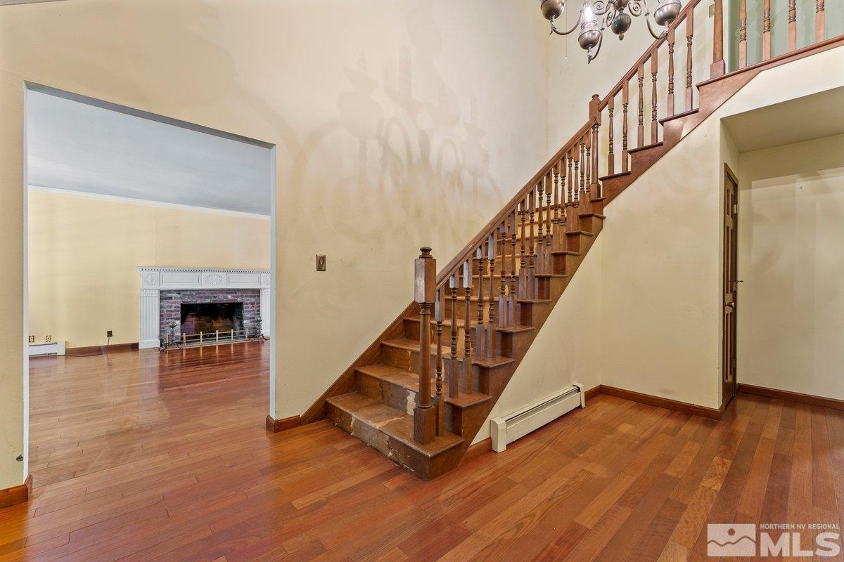1120 Monroe Street Reno, NV 89509 - Photo 4 of 27 a view of entryway and hall with wooden floor