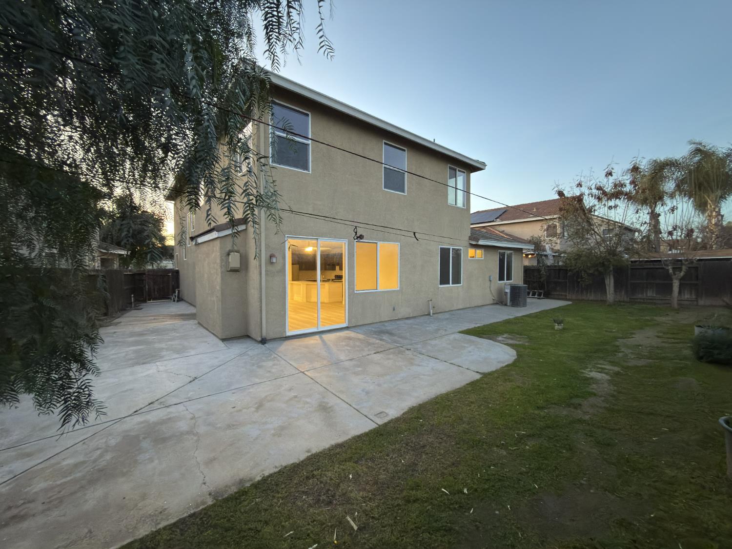 1977 Lemon Avenue Madera, CA 93637 - Photo 14 of 17 a view of a house with backyard and a tree