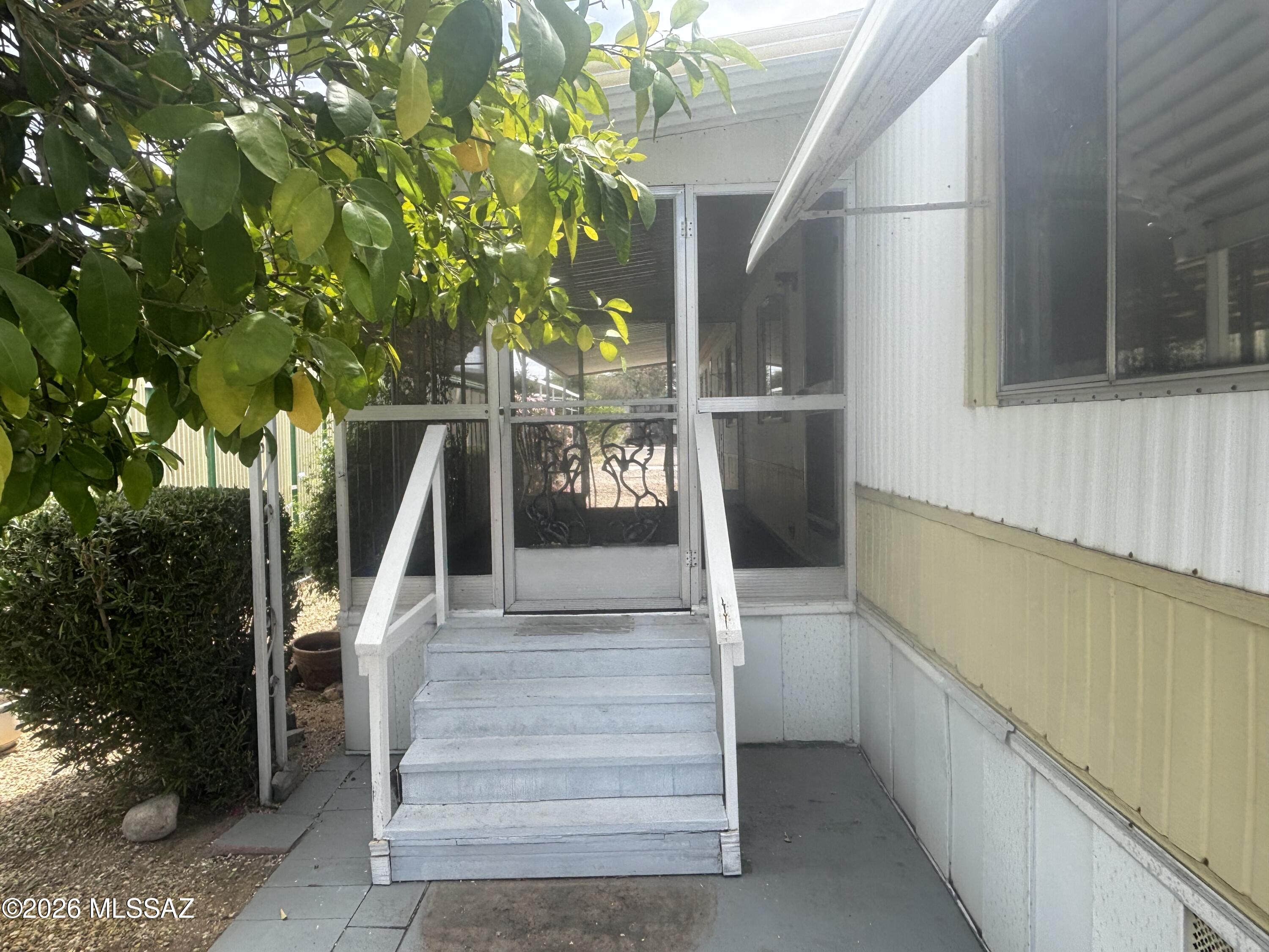 4550 North Flowing Wells Road, Unit 65 Tucson, AZ 85705 - Photo 34 of 50 a view of entryway and hall