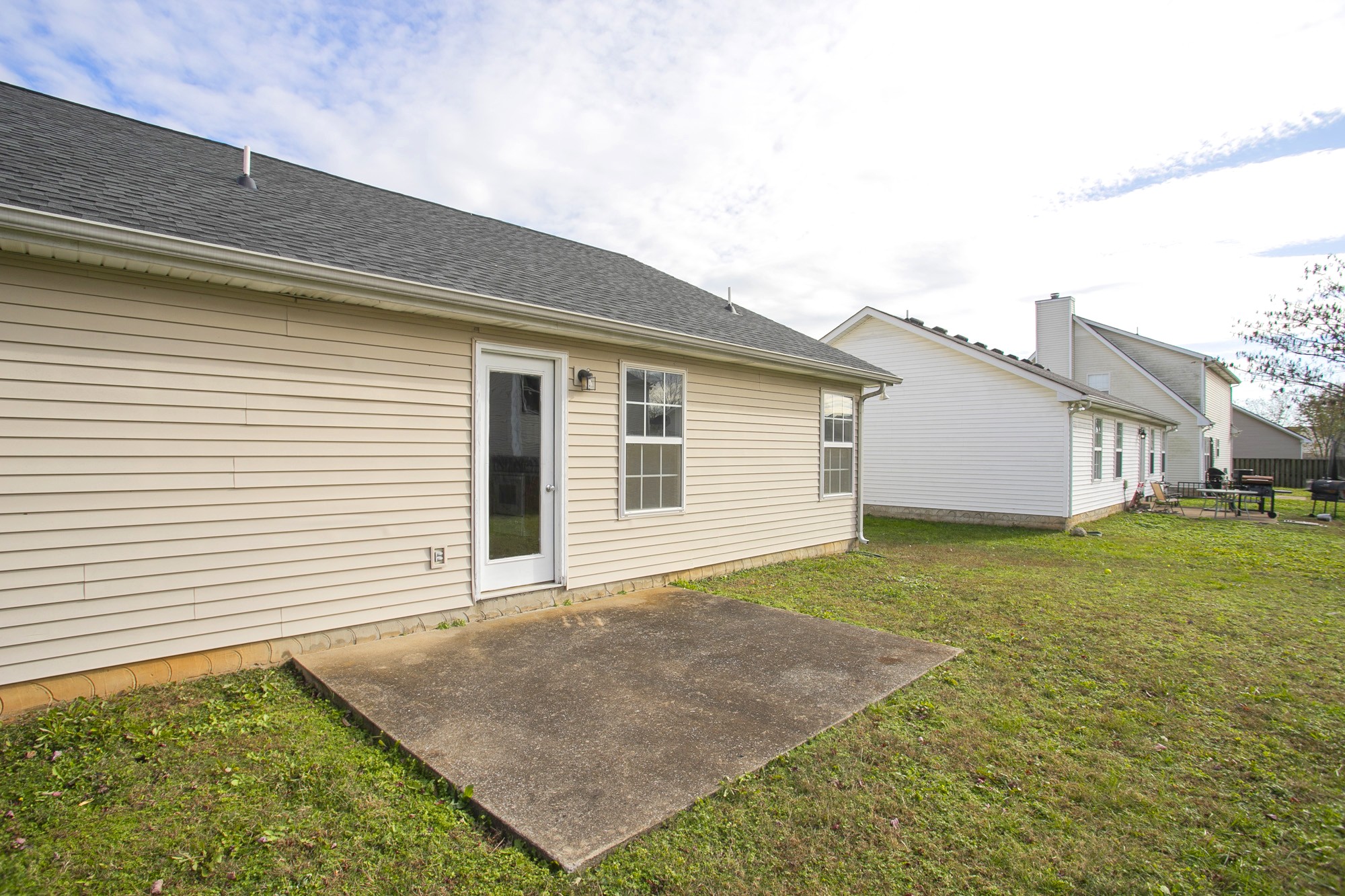 1516 Holden Court Murfreesboro, TN 37128 - Photo 18 of 23 a view of a backyard with plants and large tree