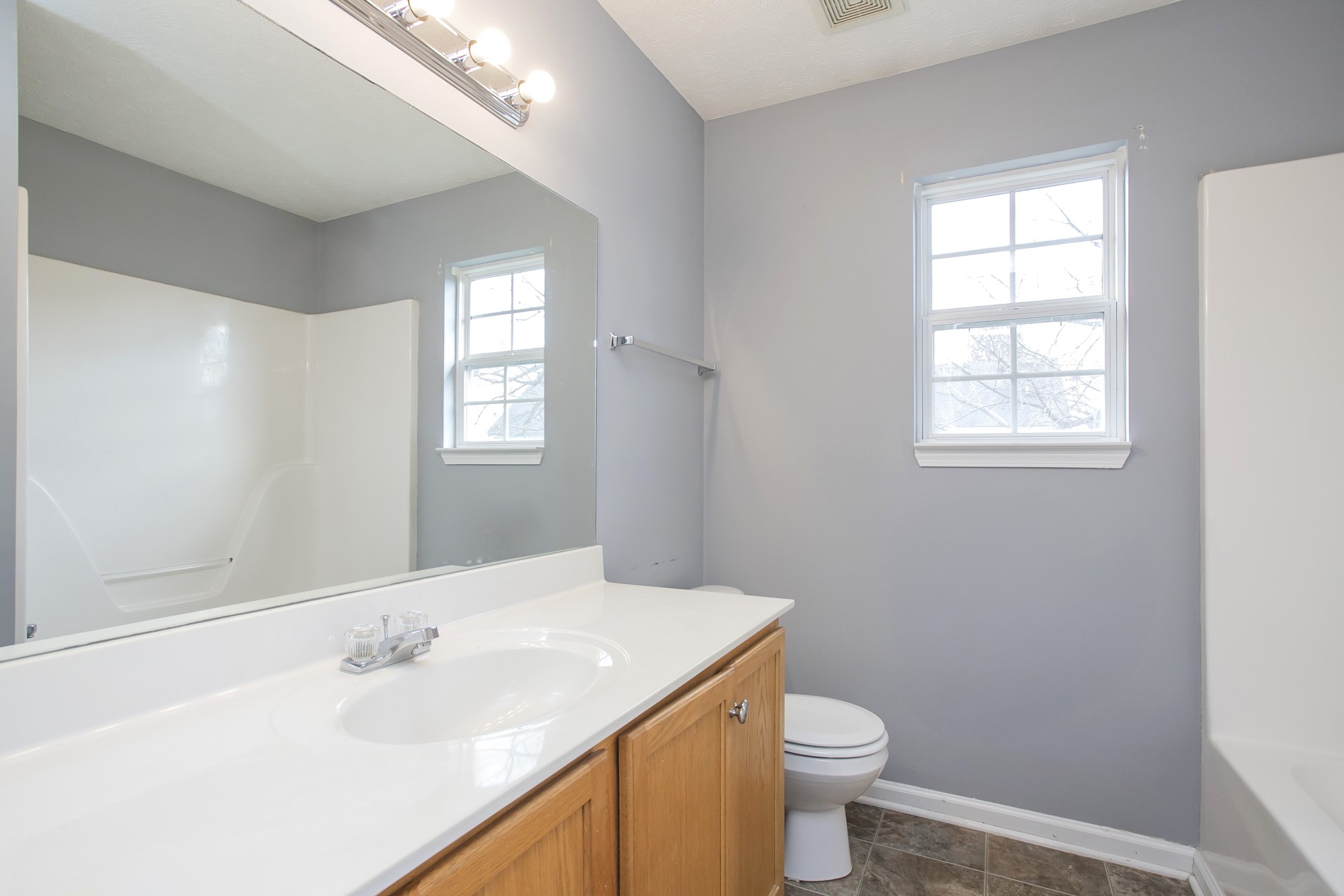 1516 Holden Court Murfreesboro, TN 37128 - Photo 9 of 23 a bathroom with a sink a toilet and window