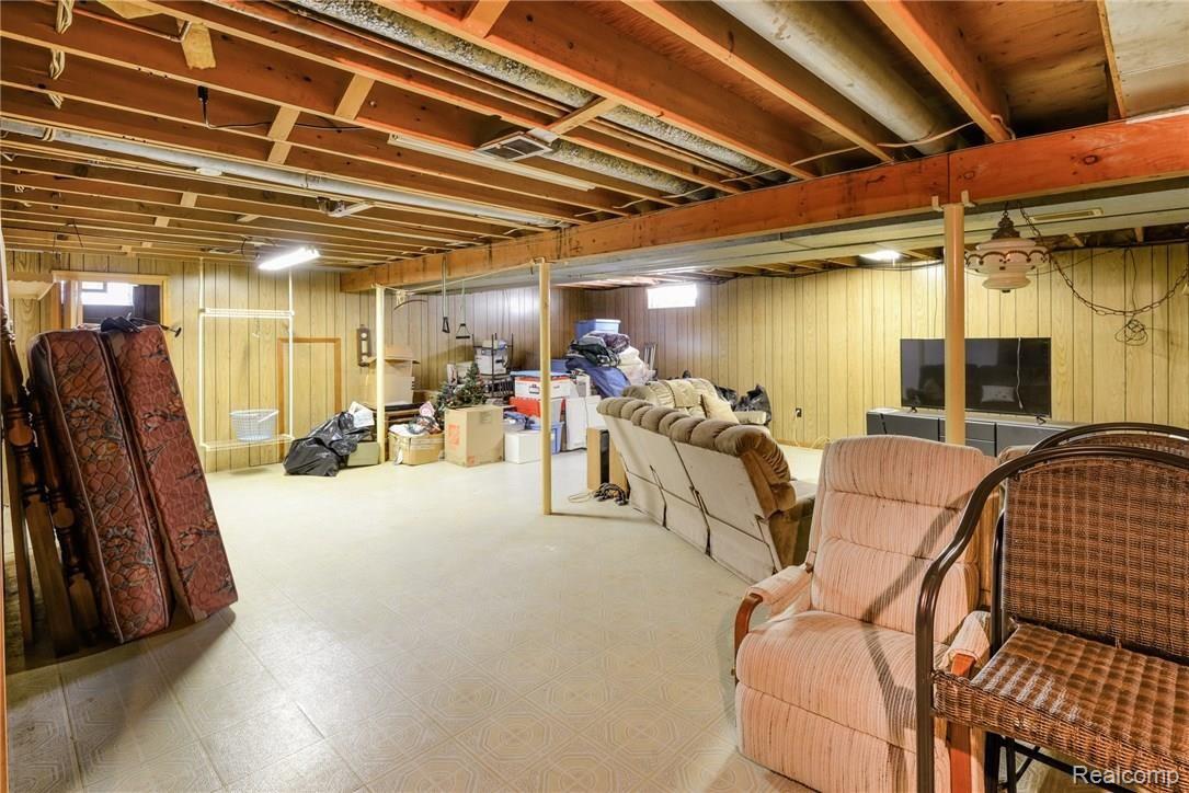 5821 West Hayner Road Fowlerville, MI 48836 - Photo 15 of 21 Basement does have some finishing touches, very dry and clean
