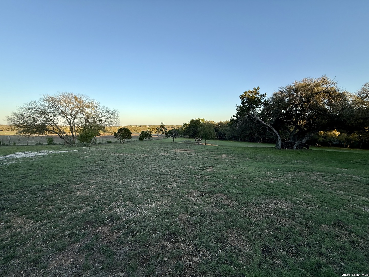 638 Cool Spring Drive Spring Branch, TX 78070 - Photo 1 of 16 a view of a grassy field