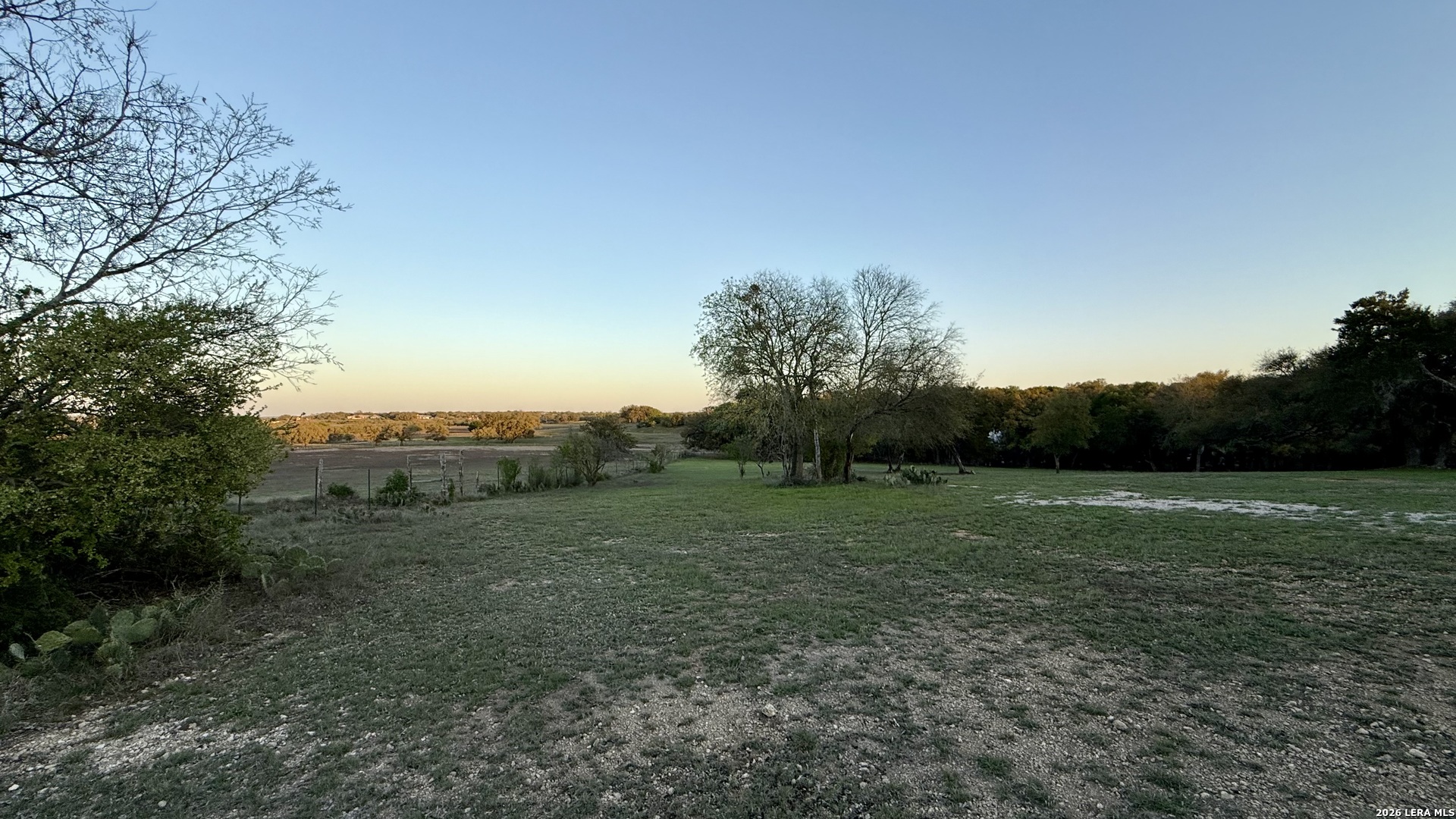 638 Cool Spring Drive Spring Branch, TX 78070 - Photo 15 of 16 a view of grassy field with trees