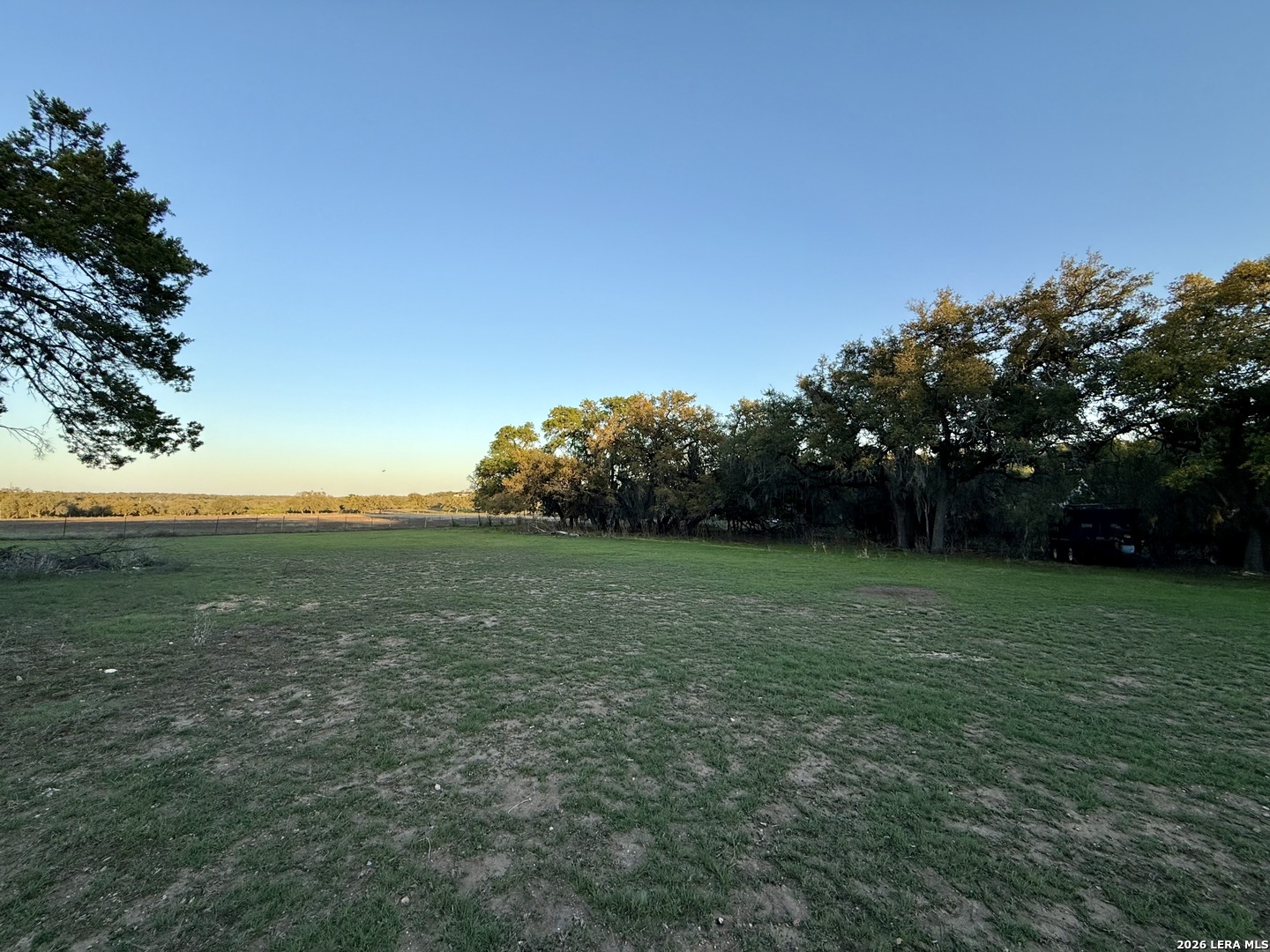 638 Cool Spring Drive Spring Branch, TX 78070 - Photo 6 of 16 a view of a field with an trees