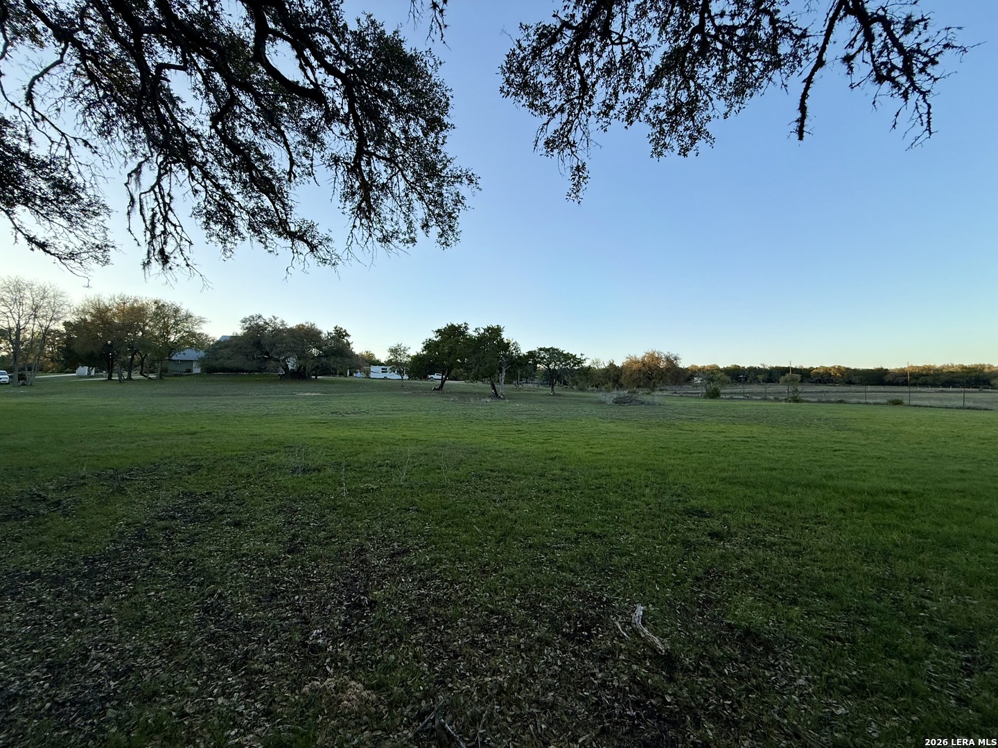 638 Cool Spring Drive Spring Branch, TX 78070 - Photo 7 of 16 a view of a grassy field