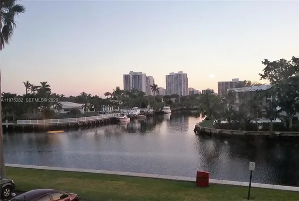 a view of a lake with a city