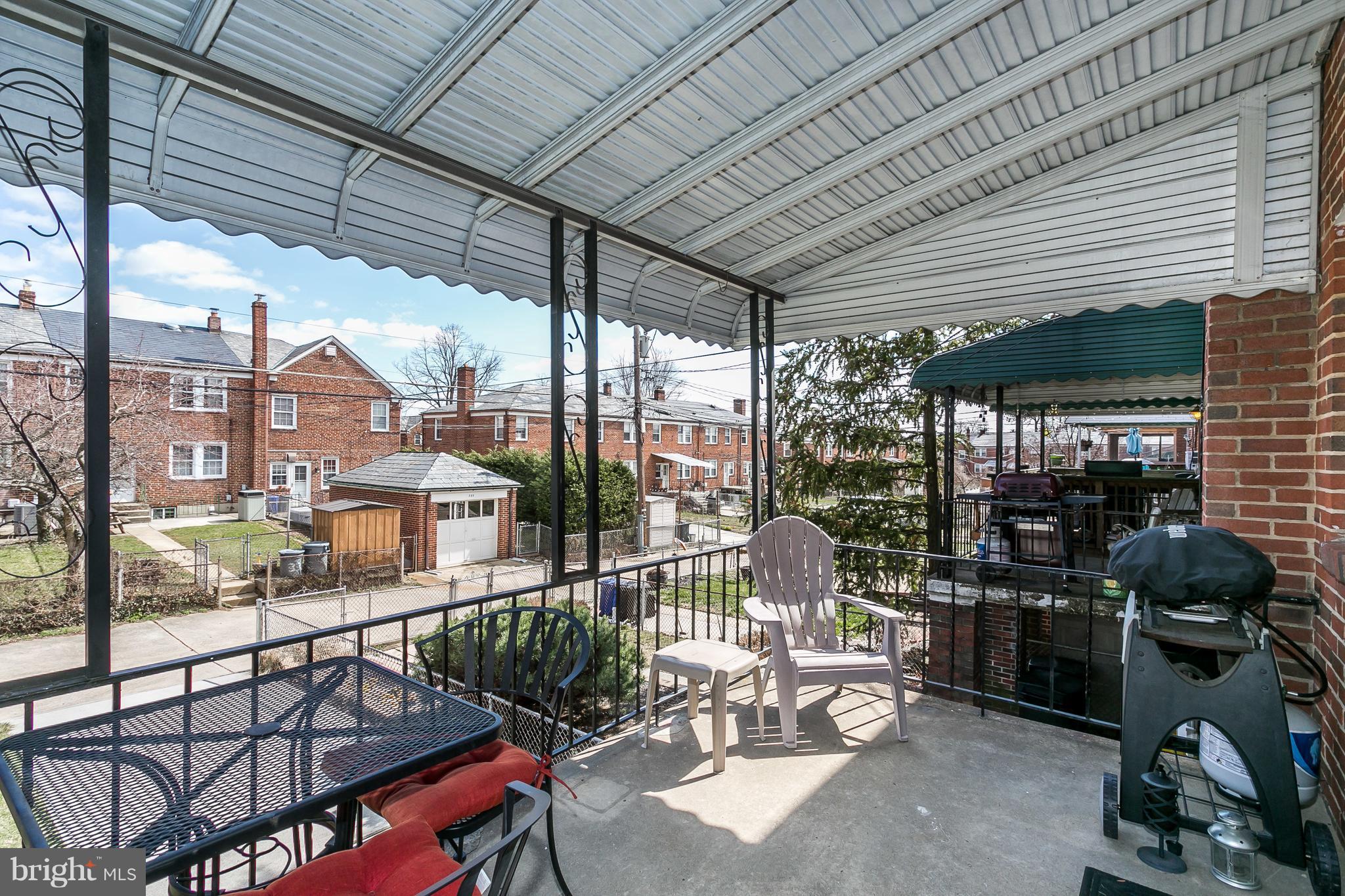 333 Greenlow Road Baltimore, MD 21228 - Photo 22 of 28 a balcony with furniture and a potted plant