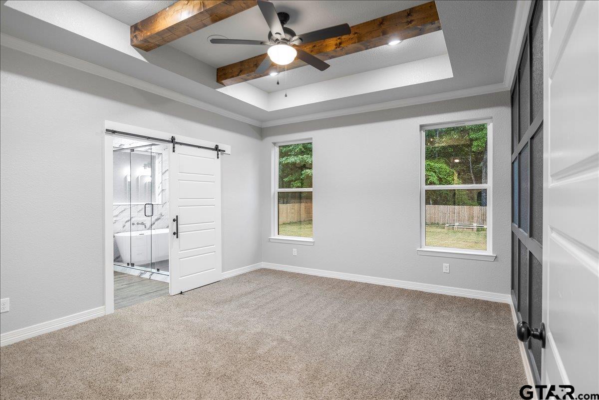 14544 Fallow Lane Lindale, TX 75706 - Photo 16 of 46 a view of an empty room with a window