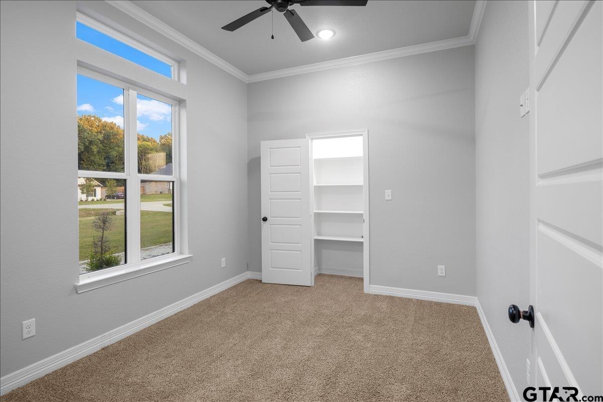 14544 Fallow Lane Lindale, TX 75706 - Photo 18 of 46 a view of an empty room with a window