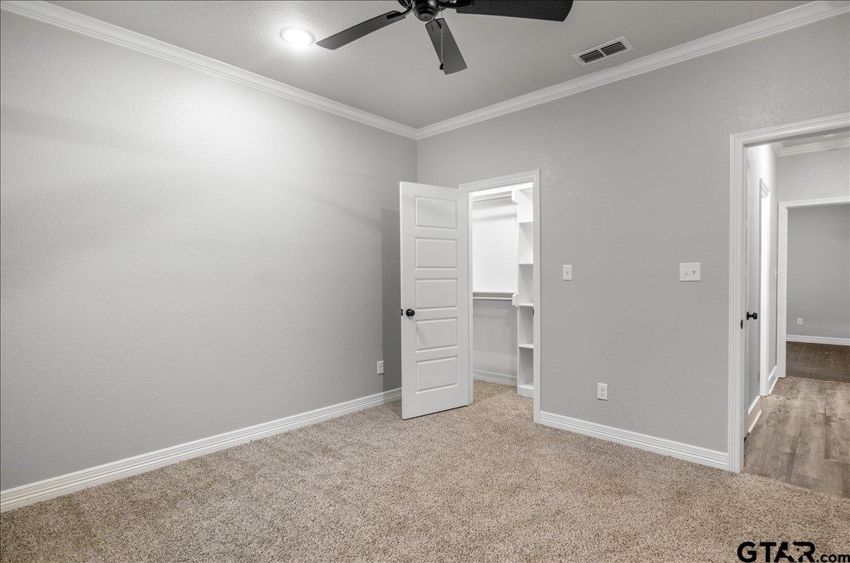 14544 Fallow Lane Lindale, TX 75706 - Photo 32 of 46 an empty room with fan