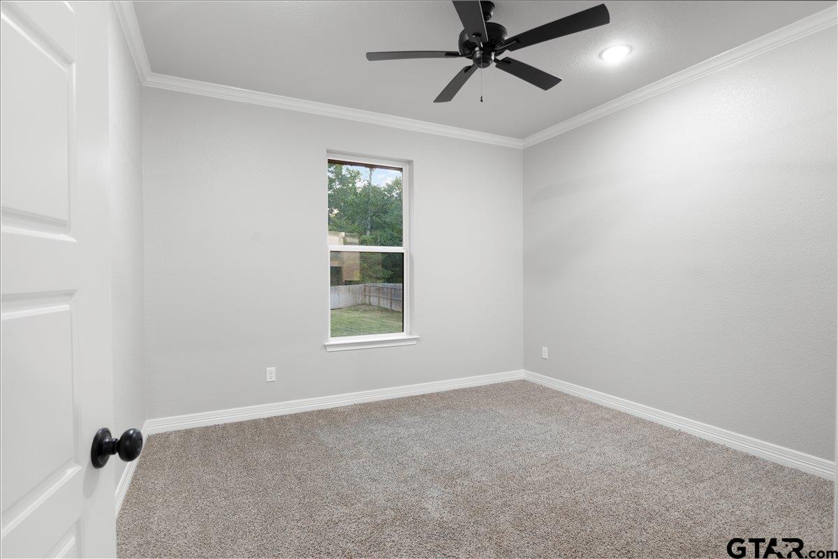 14544 Fallow Lane Lindale, TX 75706 - Photo 38 of 46 an empty room with a window