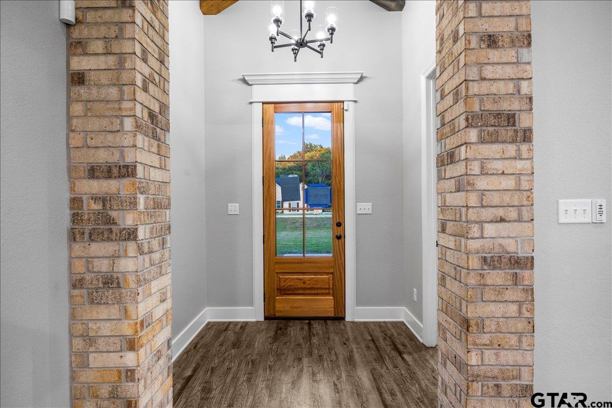14544 Fallow Lane Lindale, TX 75706 - Photo 4 of 46 wooden floor in front of door
