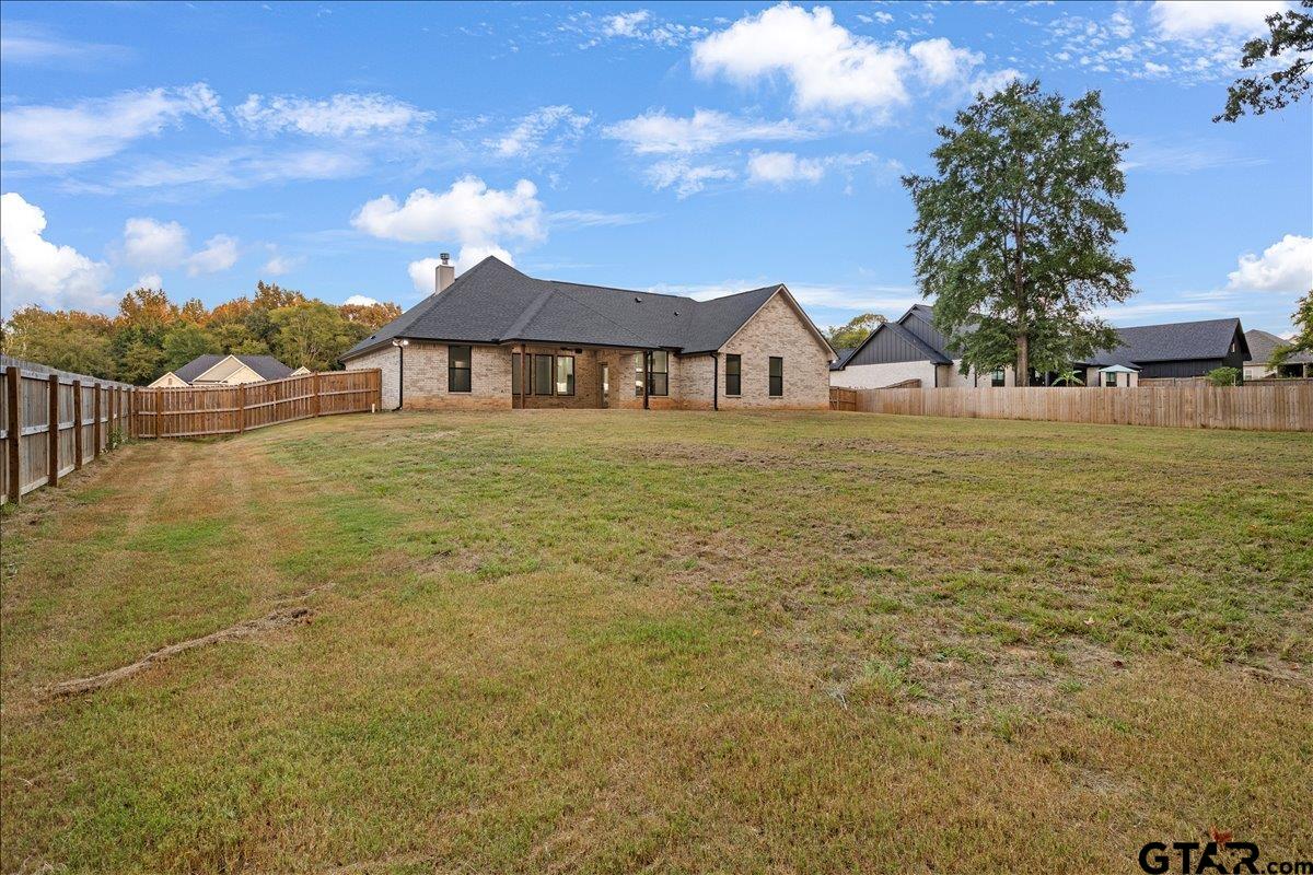 14544 Fallow Lane Lindale, TX 75706 - Photo 41 of 46 a front view of a house with a yard