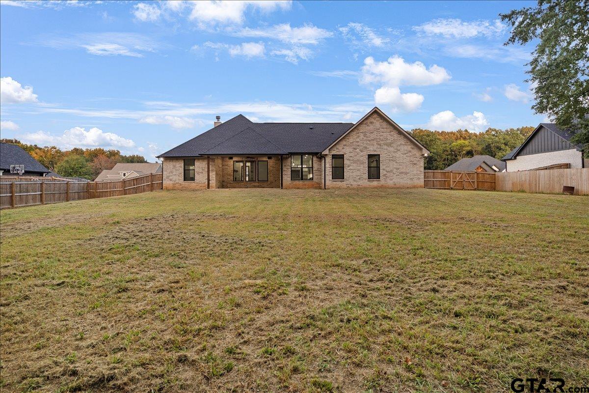 14544 Fallow Lane Lindale, TX 75706 - Photo 42 of 46 a big house with a big yard and large trees