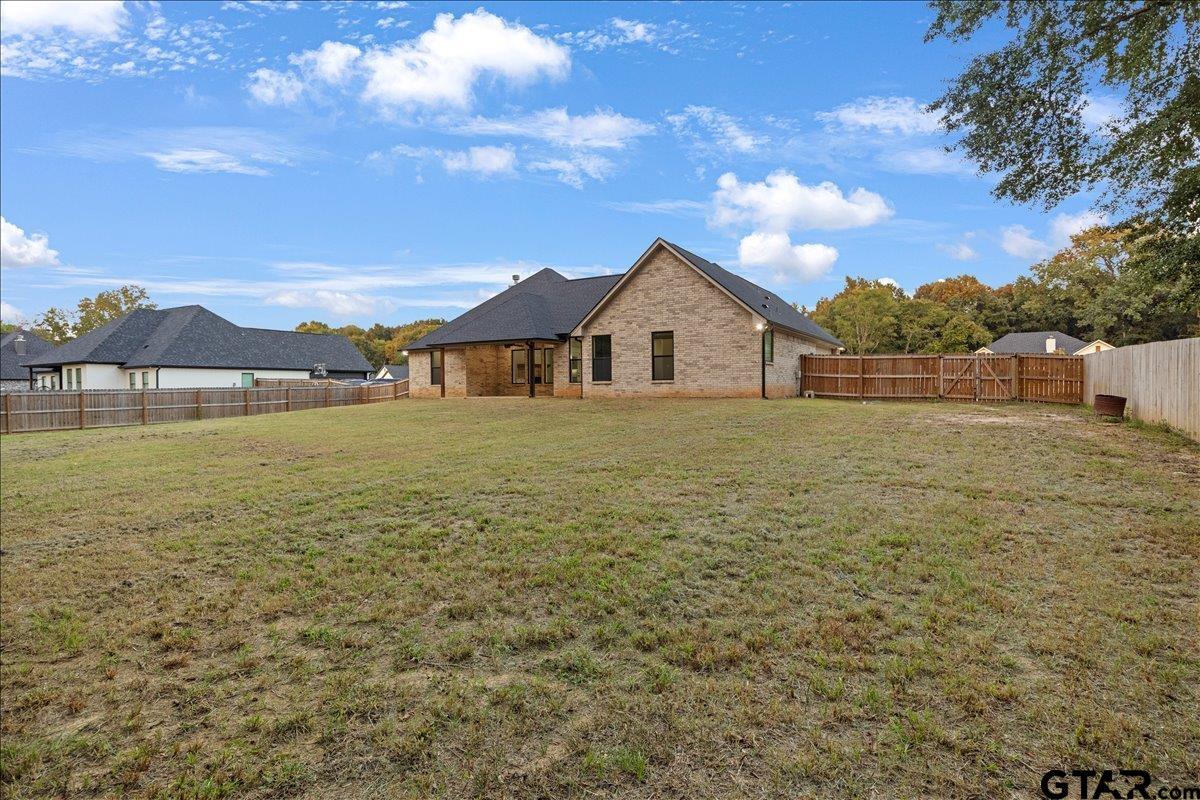 14544 Fallow Lane Lindale, TX 75706 - Photo 43 of 46 a view of a house with a yard