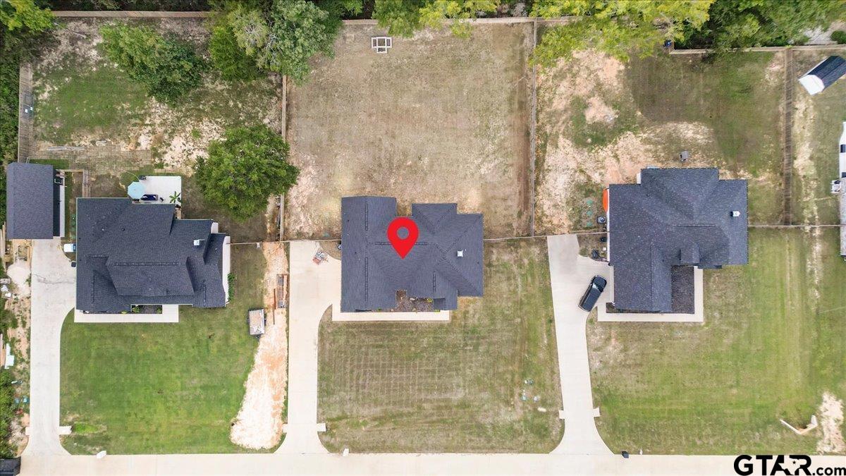 14544 Fallow Lane Lindale, TX 75706 - Photo 46 of 46 an aerial view of residential houses with outdoor space