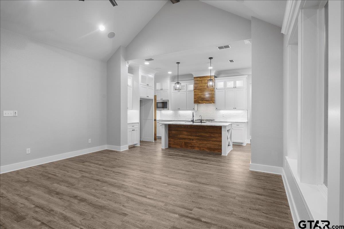 14544 Fallow Lane Lindale, TX 75706 - Photo 8 of 46 a view of kitchen with wooden floor