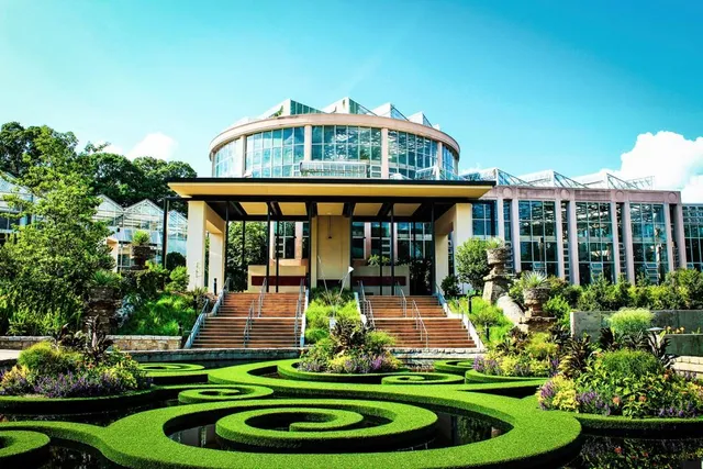 a front view of a house with a yard table and chairs
