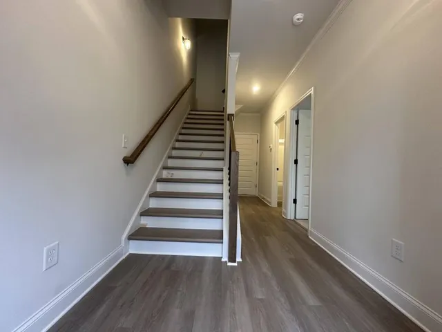 a view of entryway with wooden floor