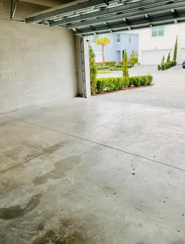 a view of a living room and chandelier