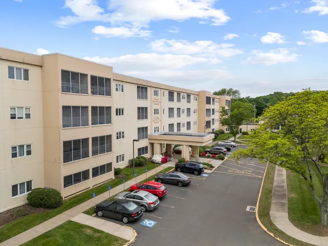 a group of people sitting in a living room