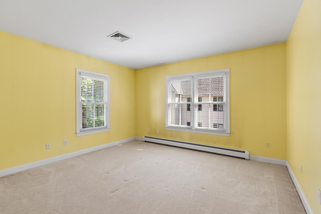56 Brook Street, Unit B Manchester, MA 01944 - Photo 27 of 37 a view of an empty room with a window