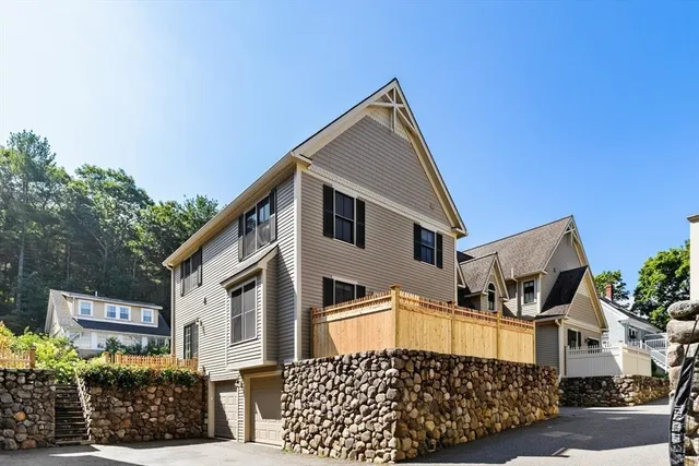 a view of a house with a garage