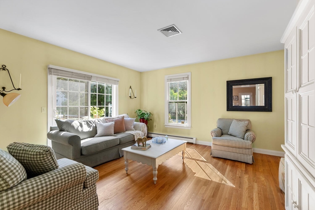 56 Brook Street, Unit B Manchester, MA 01944 - Photo 6 of 37 a living room with furniture and a large window