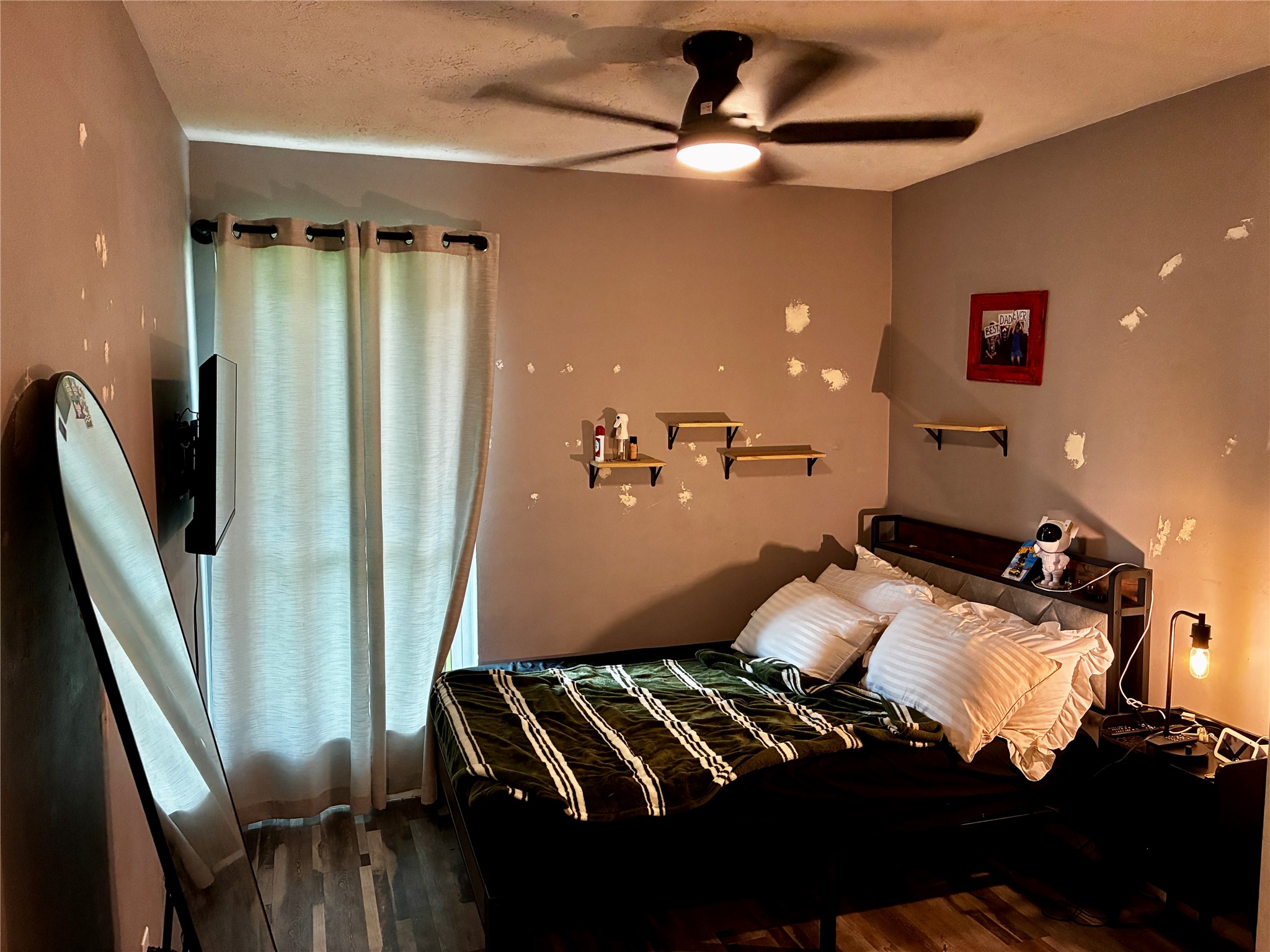 2 Sarita Road Angleton, TX 77515 - Photo 16 of 21 a bedroom with furniture and a window