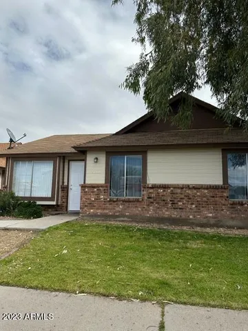 a house view with a garden space