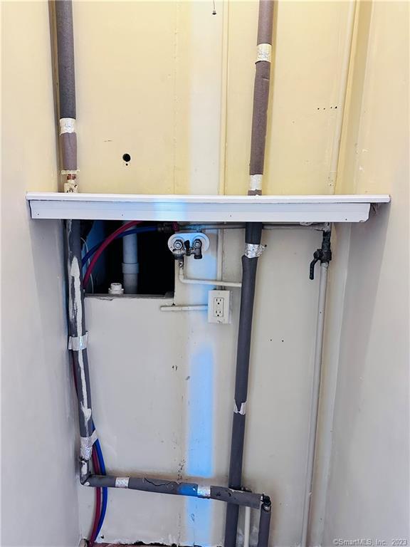 398 Park Street, Unit 3 New Britain, CT 06051 - Photo 16 of 17 a bathroom with a sink and mirror