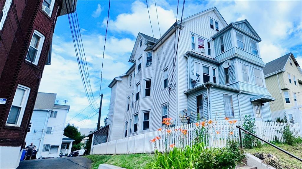 398 Park Street, Unit 3 New Britain, CT 06051 - Photo 17 of 17 a view of a building with a outdoor space