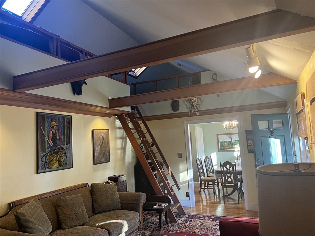 137 Warwick Road, Unit 137 Newton, MA 02465 - Photo 3 of 8 a living room with furniture