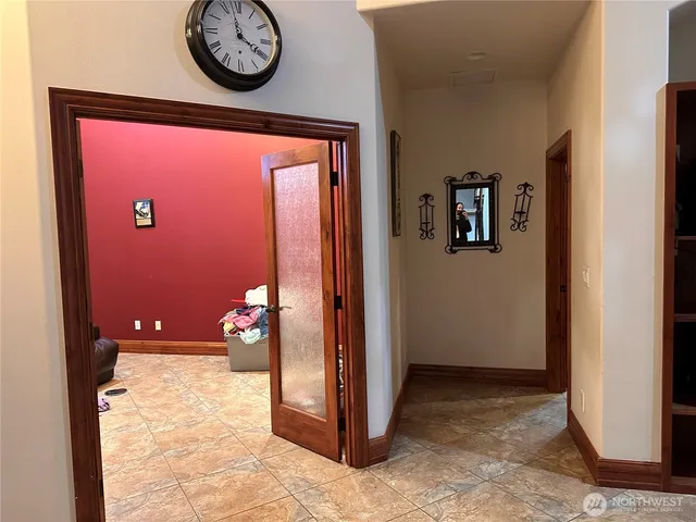 a bathroom with a tub shower and sink