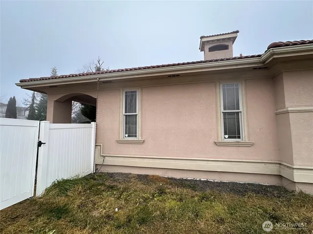 a view of a house with a large window