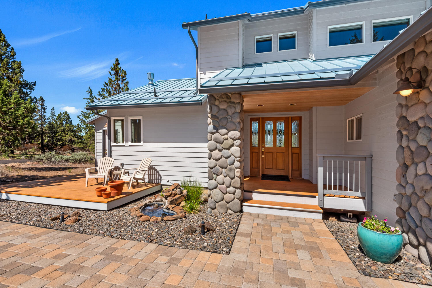 65230 Smokey Ridge Road Bend, OR 97703 - Photo 14 of 53 Entry w/east facing deck & water feature