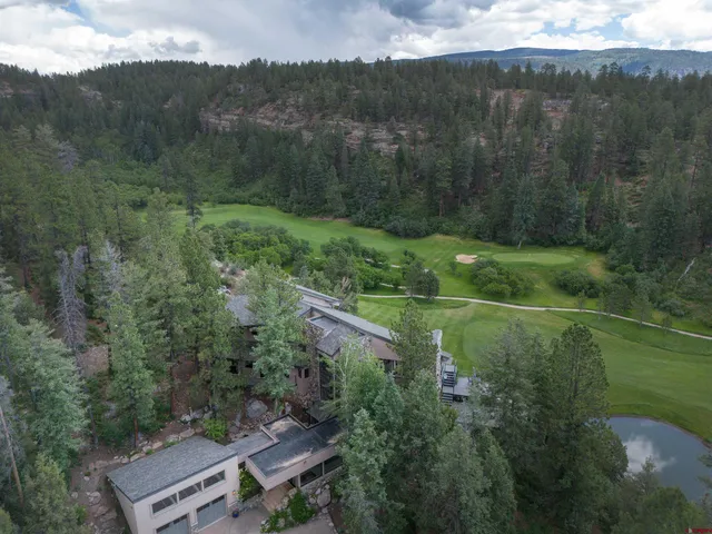 an aerial view of house with an outdoor space