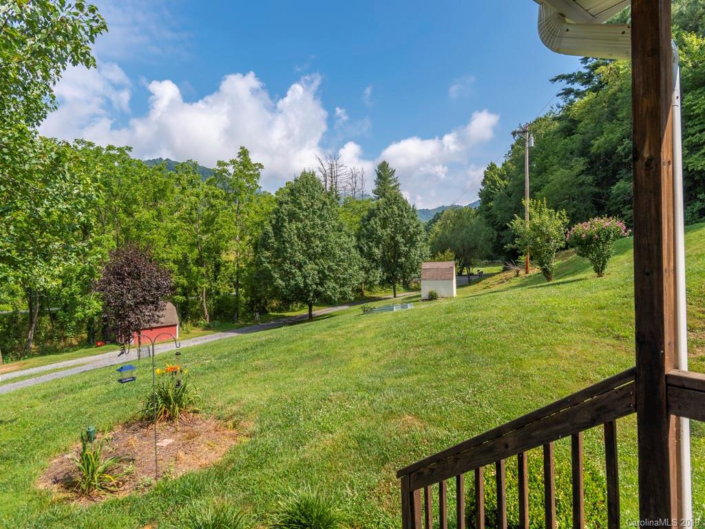 2488 Thickety Road Clyde, NC 28721 - Photo 15 of 25 a park with lots of green space and trees