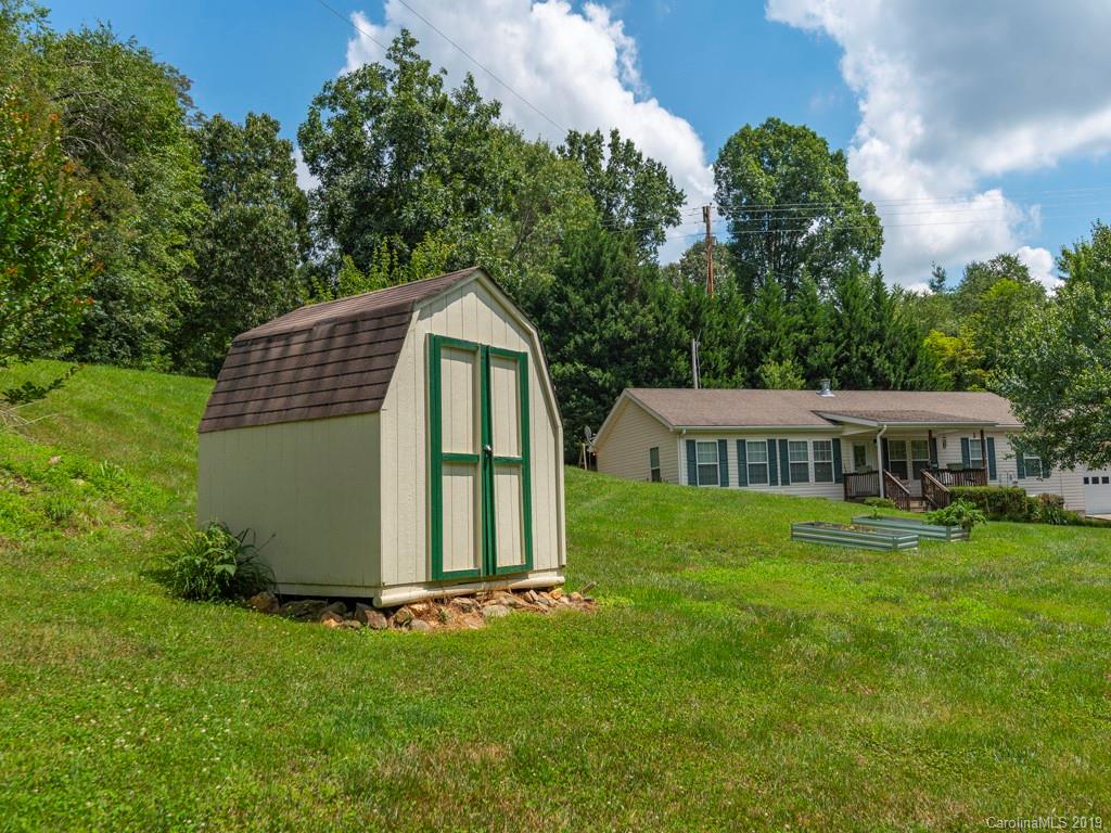 2488 Thickety Road Clyde, NC 28721 - Photo 20 of 25 a view of a house with a backyard