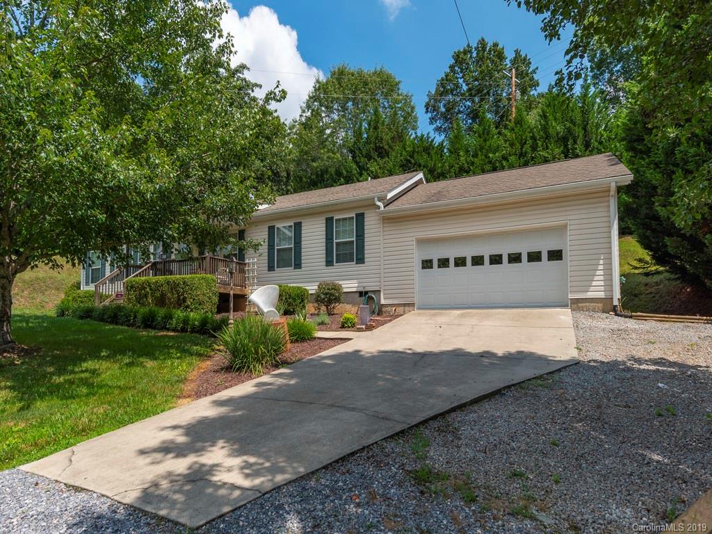 2488 Thickety Road Clyde, NC 28721 - Photo 23 of 25 a view of a house with a yard