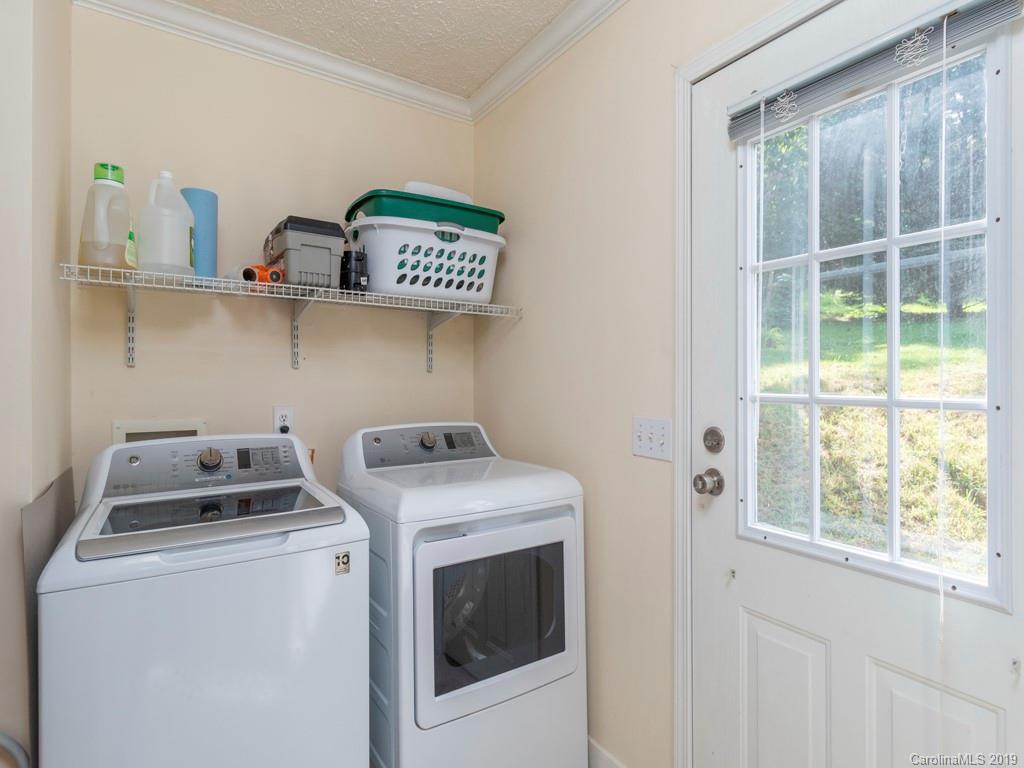 2488 Thickety Road Clyde, NC 28721 - Photo 7 of 25 a utility room with dryer and washer